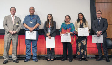 From left: Chanccellor Cam Patterson with the Chancellor's Awards for Excellence recipients Wayne Wahls, Clare Brown, Joan Cranmer, Analiz Rodriguez and Lawrence Greiten.