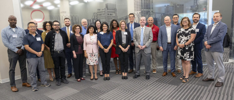 The first cohort of the UAMS-UAF Executive Healthcare Leadership Program pose for a photo with their facilitators and UAMS Chancellor Cam Patterson, M.D., MBA, recently. 