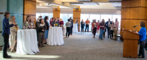 Provost Stephanie Gardner, Pharm.D., Ed.D., speaks to new UAMS faculty members during the Sept. 26 New Faculty Reception, hosted by the Center for Faculty Excellence.